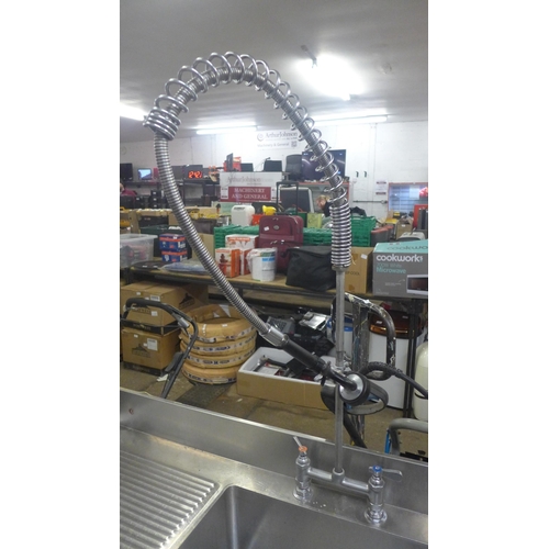 2261 - A stainless steel double sink with hose tap