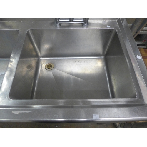 2261 - A stainless steel double sink with hose tap