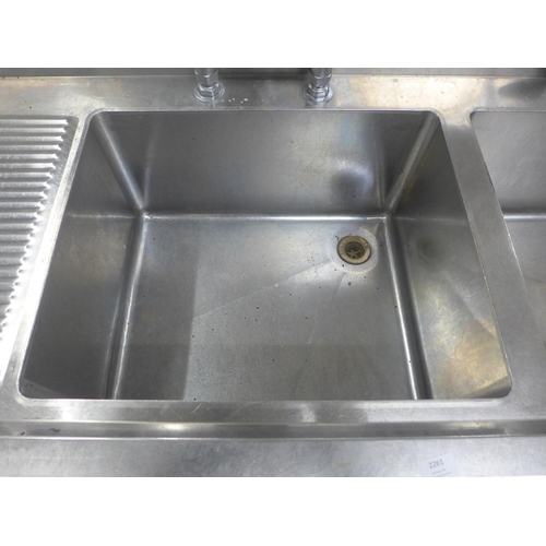 2261 - A stainless steel double sink with hose tap