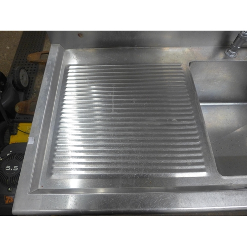 2261 - A stainless steel double sink with hose tap