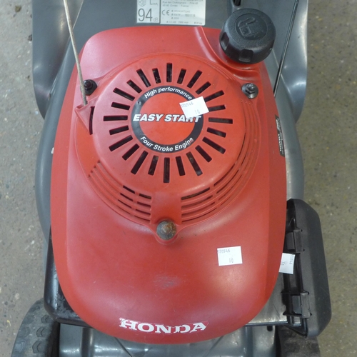 2261B - A Honda high performance four stroke easy-start petrol lawn mower - Police repossession