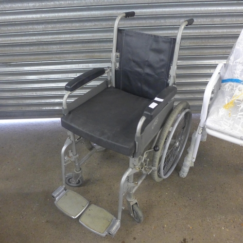 2268 - A large wheel wheelchair and two shower stools