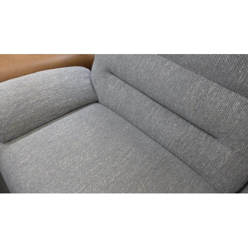 1429 - A grey hopsack reclining three seater sofa