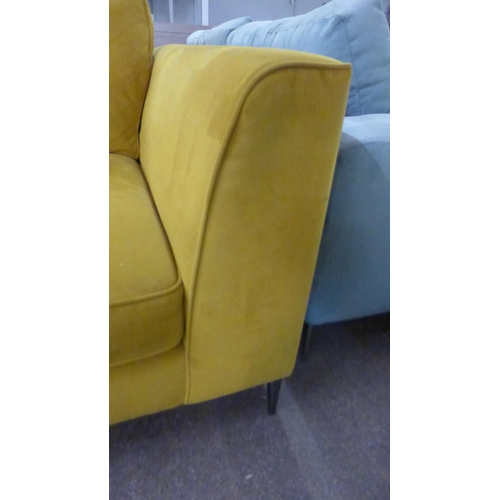 1489 - A turmeric velvet two seater sofa