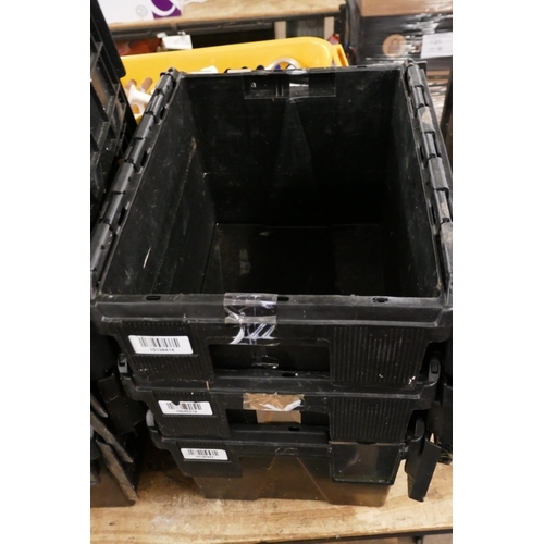 2419 - Seven black stackable storage crates