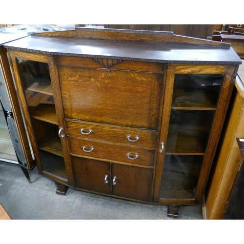 109 - An Art Deco oak side by side bureau bookcase