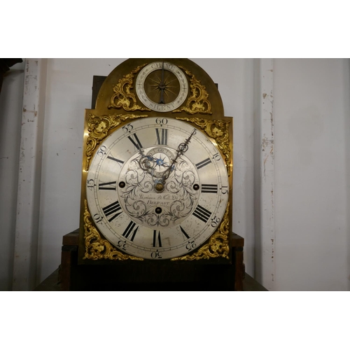 115 - An early 20th Century Irish oak longcase clock, the brass dial signed Sharman D. Neill Ltd., Belfast