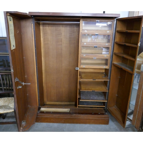 120 - An Art Deco mahogany fitted Compactum wardrobe