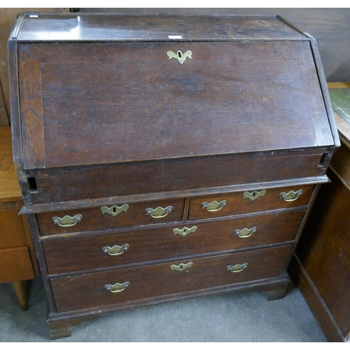 125 - A George II oak bureau