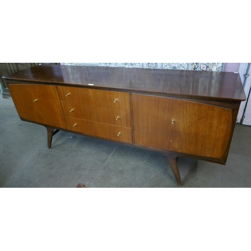 14 - A Beautility teak sideboard