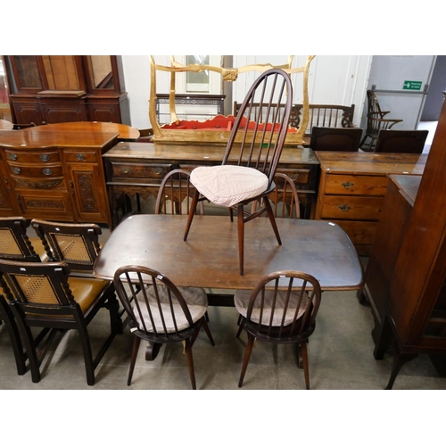 161 - An Ercol Golden Dawn elm refectory table and five Quaker chairs