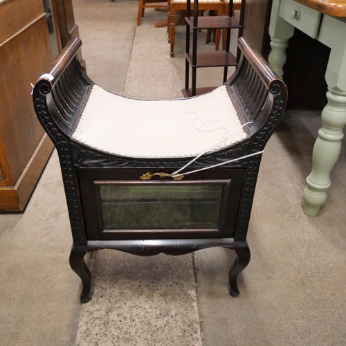 168 - An Edward VII ebonised piano stool