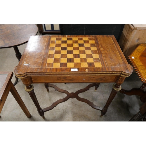 170 - A French 19th Century style walnut fold over games table