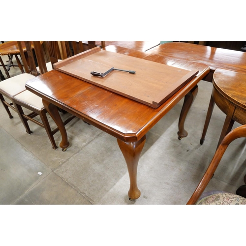 174 - A late Victorian mahogany extending dining table