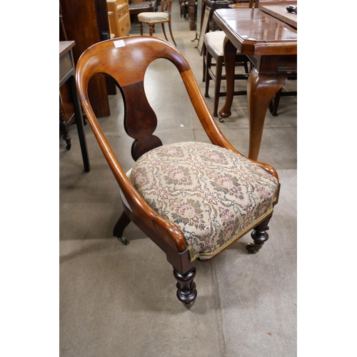 176 - A Victorian mahogany nursing chair