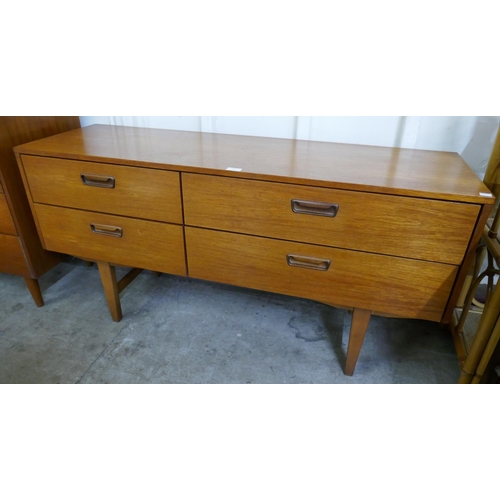 18 - A teak four drawer sideboard