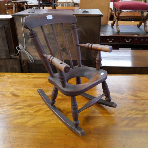 180 - A Victorian child's elm and beech rocking chair