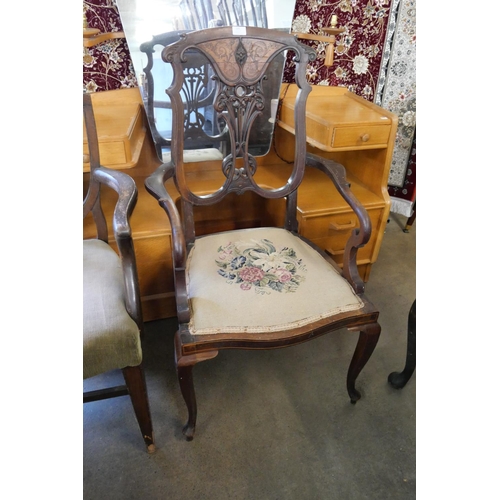 185 - An Edward VII inlaid mahogany elbow chair