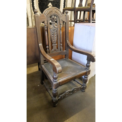 186 - A Victorian Jacobean Revival oak Bishops chair