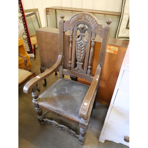 186 - A Victorian Jacobean Revival oak Bishops chair