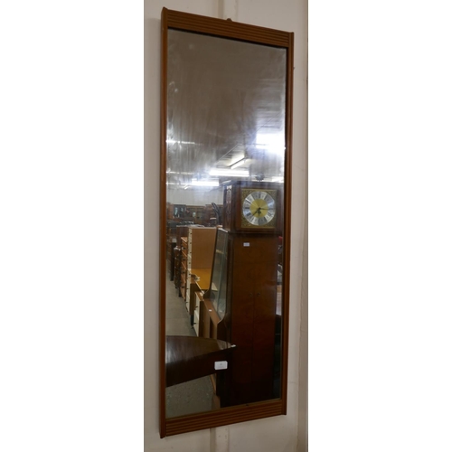 21 - A teak framed mirror