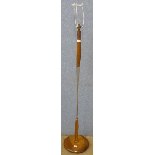 214 - A teak standard lamp