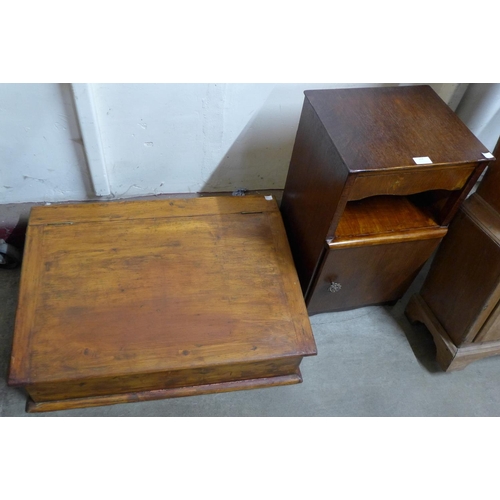 222 - A Victorian pine table top clerk's desk and an oak pot cupboard