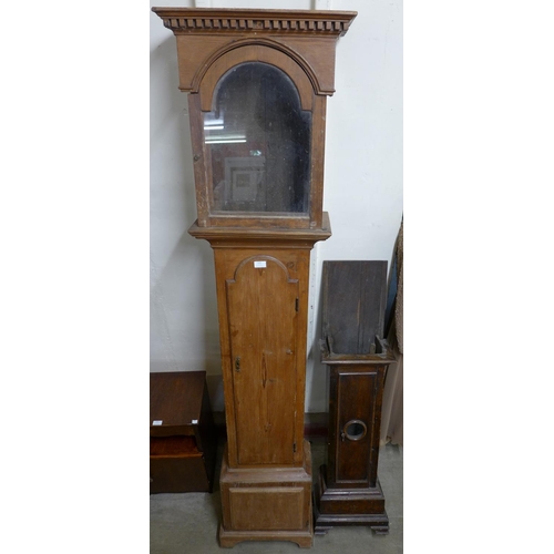 223 - An early 18th Century pine longcase clock case and a 17th Century oak dwarf cased clock case