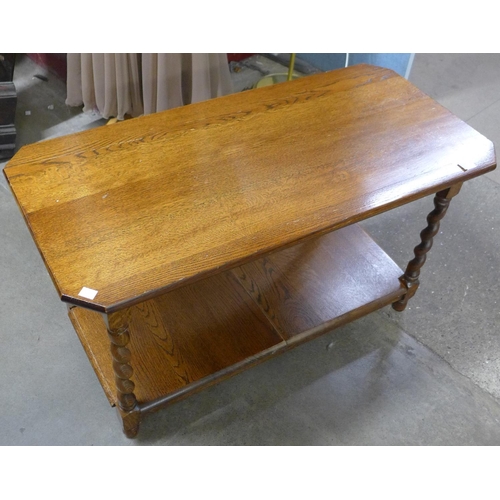 224 - An oak barleytwist octagonal coffee table