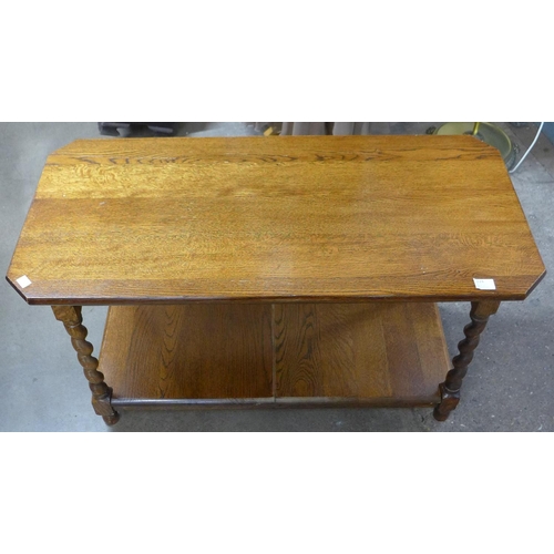 224 - An oak barleytwist octagonal coffee table