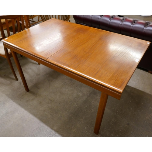 23 - A White & Newton teak rectangular extending dining table