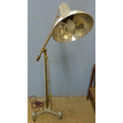 232 - An industrial brass and alloy anglepoise floor standing spotlight