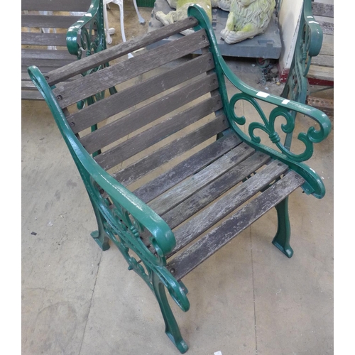 233 - A cast iron ended garden bench and chair