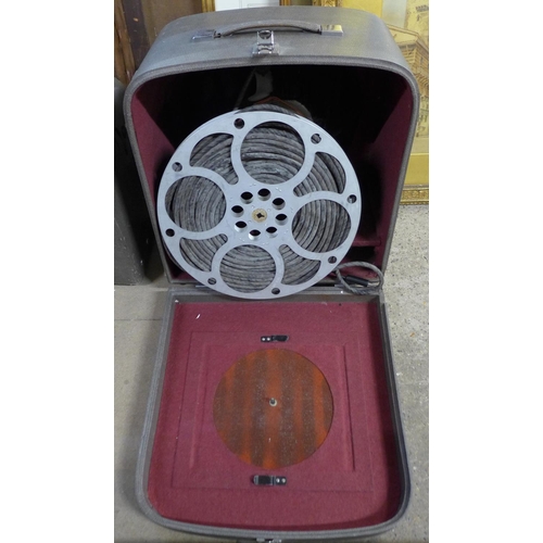 247 - A Bell & Howell film projector, speaker and transformer