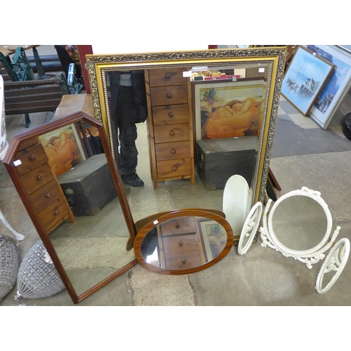 249 - A gilt framed mirror, a cream dressing table mirror and two others