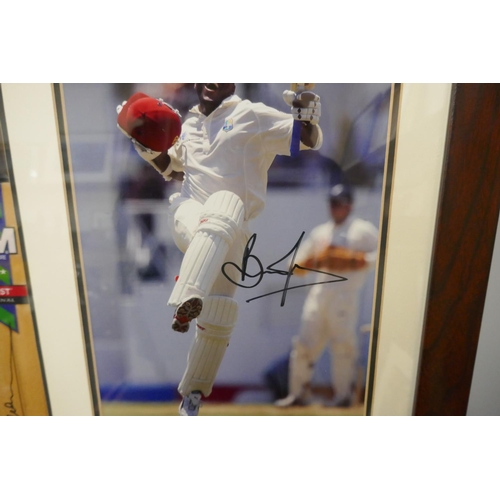 265 - A framed cricket display, photograph and miniature cricket bat, both signed by Brian Lara, West Indi... 