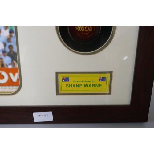 266 - A framed cricket display, photograph and signed Morgan's cricket ball by Shane Warne, 'The World's G... 