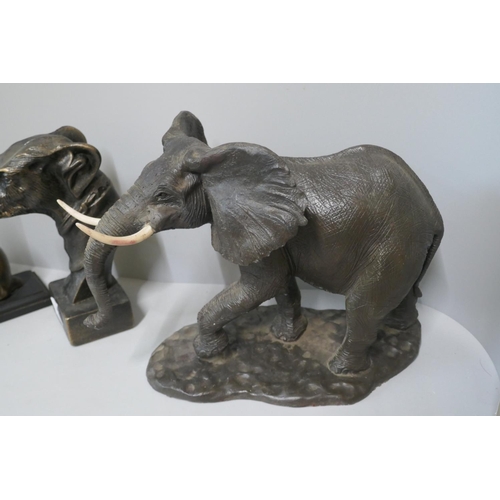 267 - A large resin sculpture of an African elephant, a bronze sculpture of a seated hound and a bronze sc... 