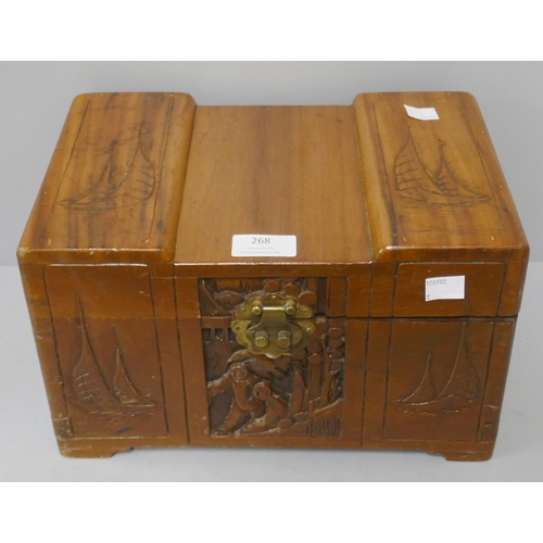 268 - A miniature oriental carved camphorwood blanket box