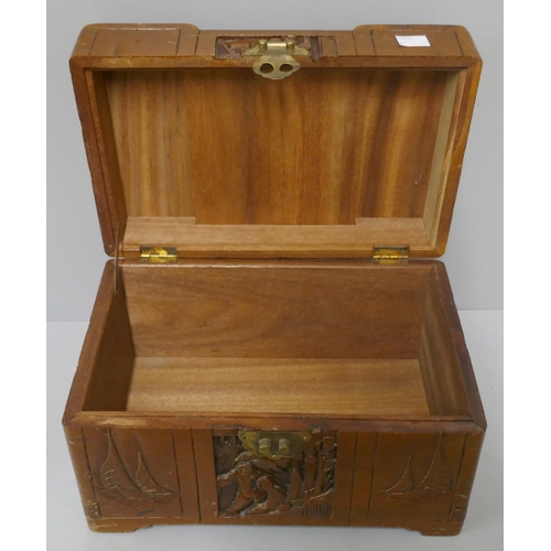 268 - A miniature oriental carved camphorwood blanket box