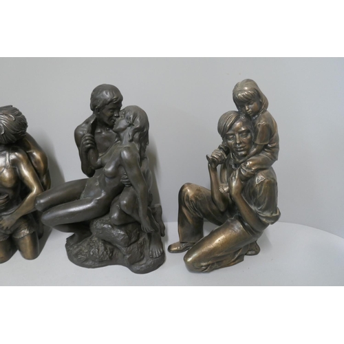 270 - Four resin sculptures; two Lovers, a female nude and father with daughter on shoulders