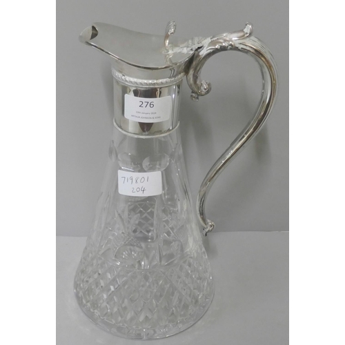 276 - A silver plated and cut crystal glass claret jug