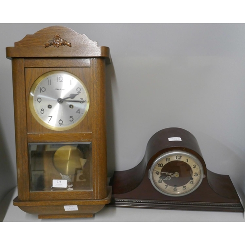 278 - A German oak wall clock and a mantel clock