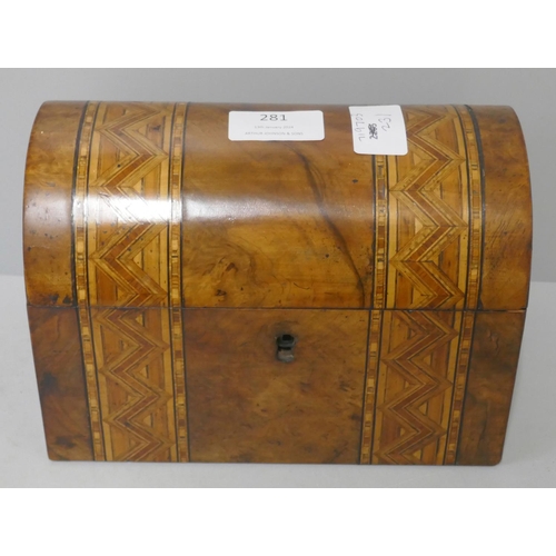 281 - A Victorian inlaid walnut domed top tea caddy