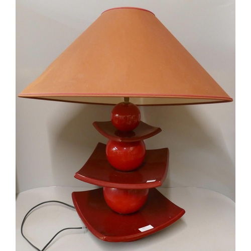 295 - A 1960s style red table lamp