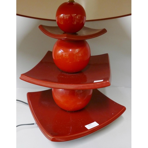 295 - A 1960s style red table lamp