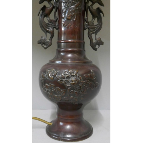 308 - A Chinese bronze table lamp