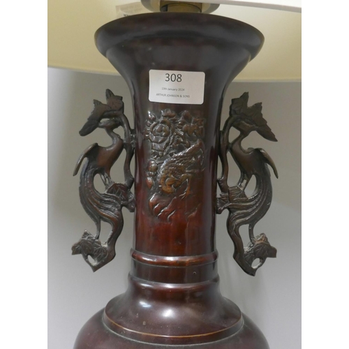 308 - A Chinese bronze table lamp