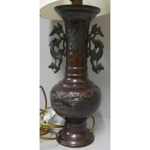 308 - A Chinese bronze table lamp