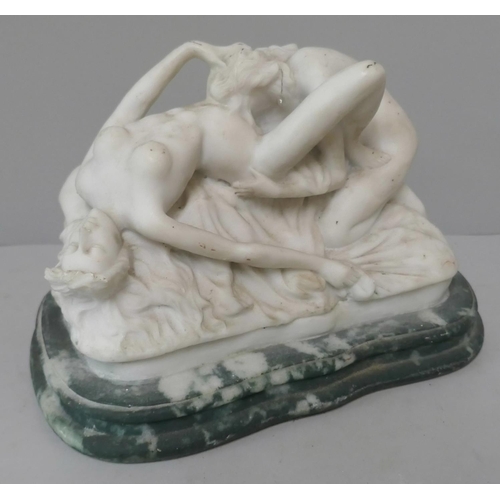 313 - A faux marble erotic figure group of two ladies